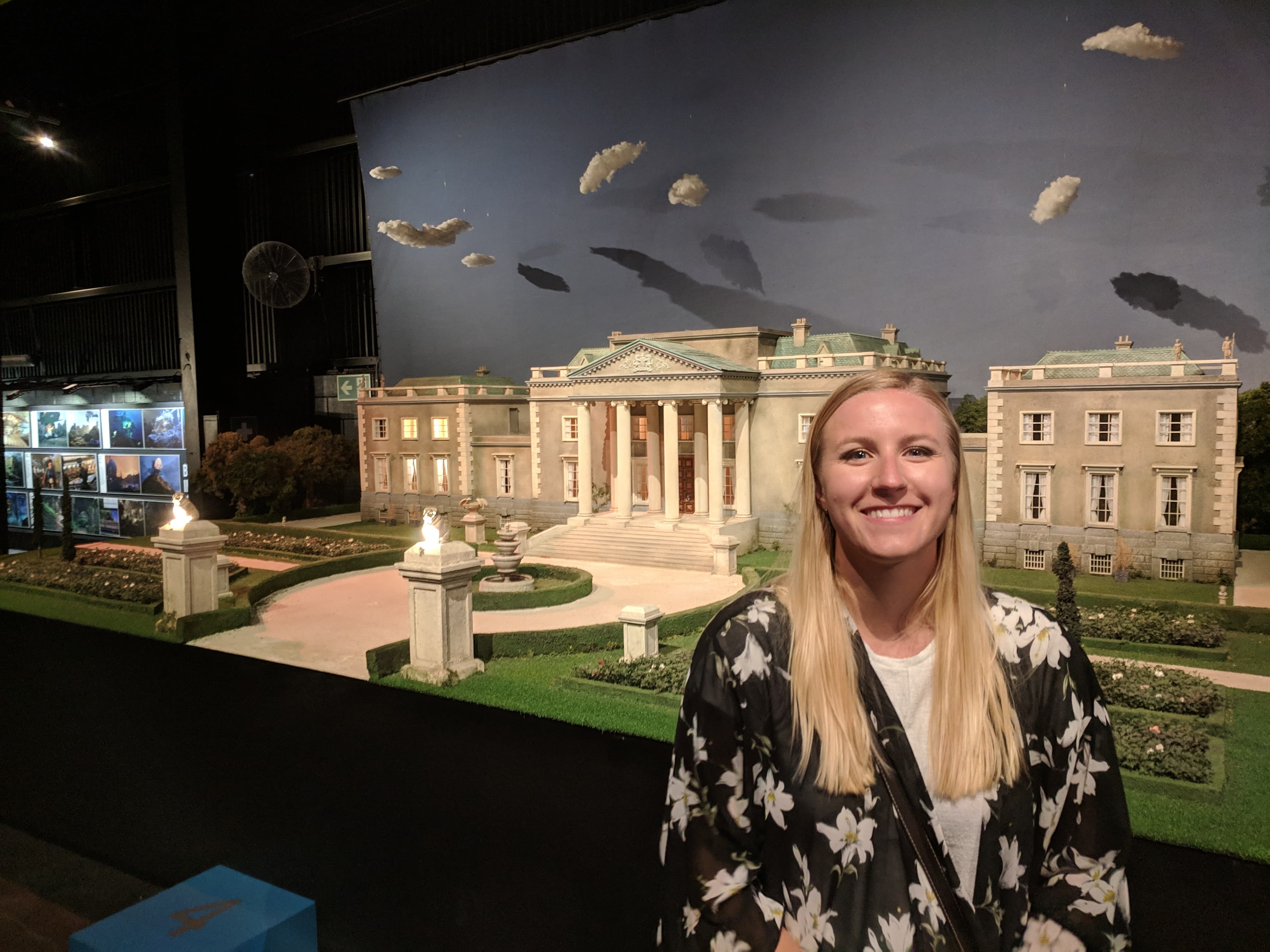 Lauren in front of Thunderbirds mansion at Weta Workshop