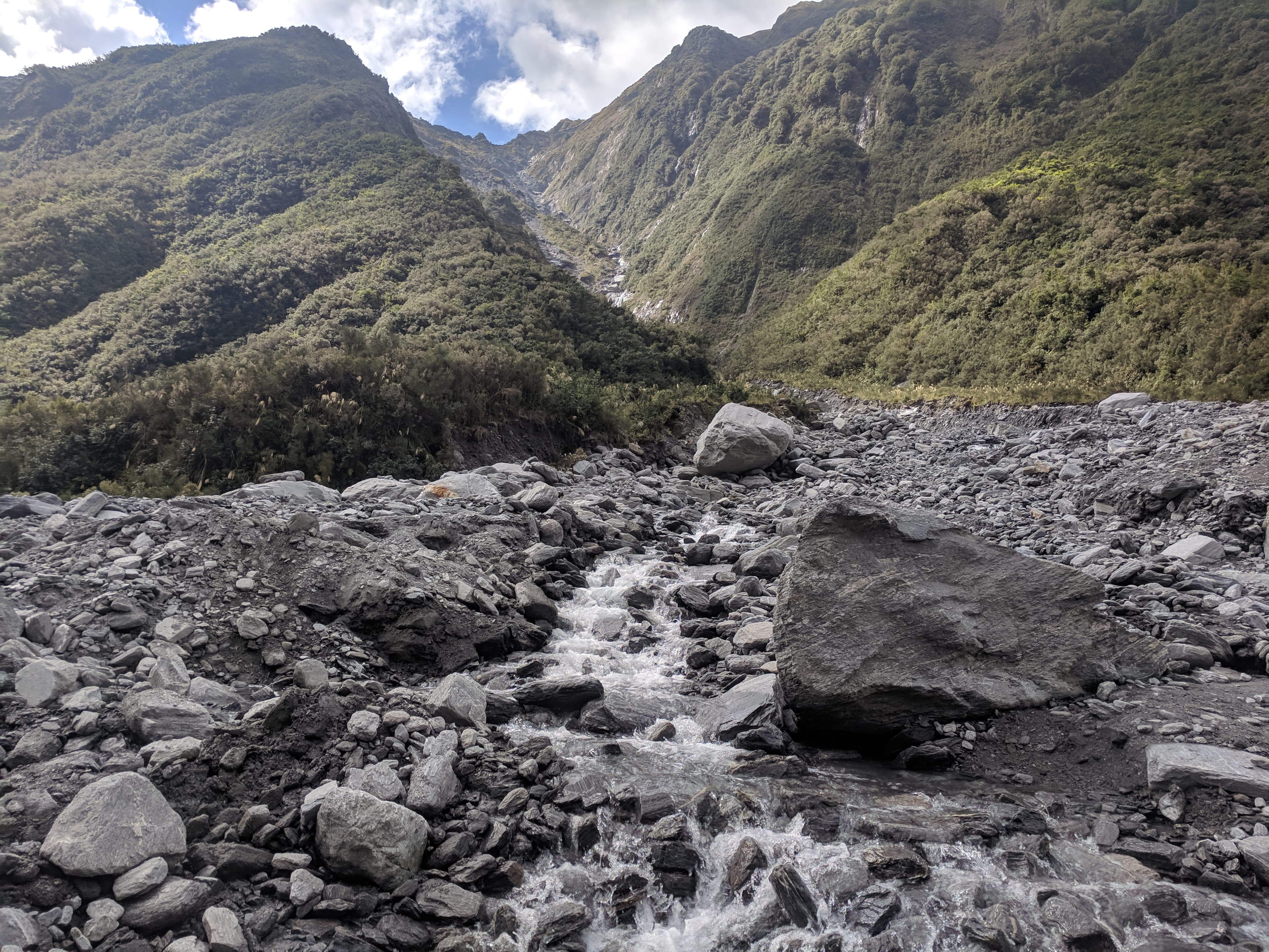 Some water rolling over rocks near Fox Glacier Some water rolling over rocks near Fox Glacier