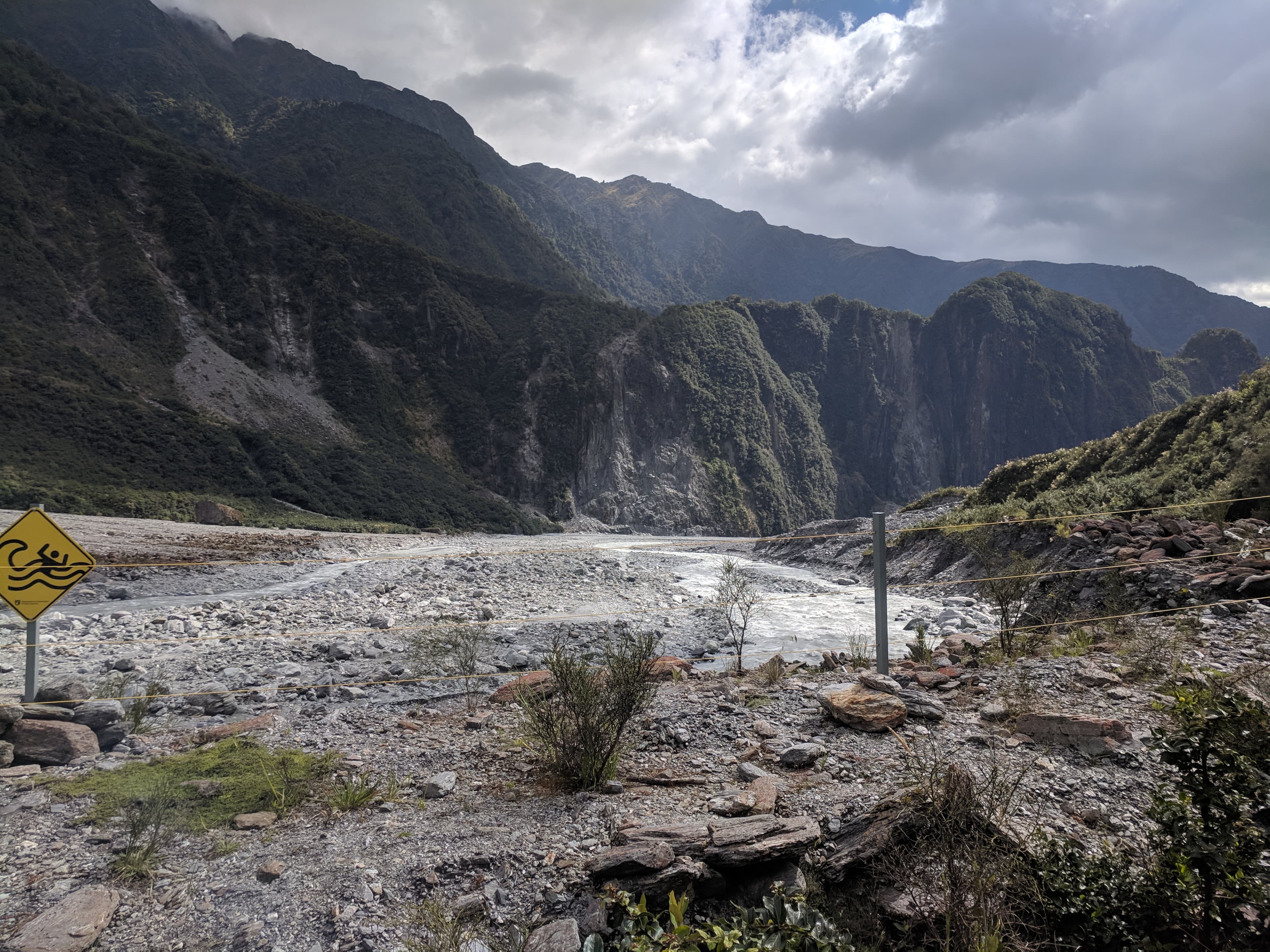 Glacier water running down the valley at Fox Glacier Glacier water running down the valley at Fox Glacier