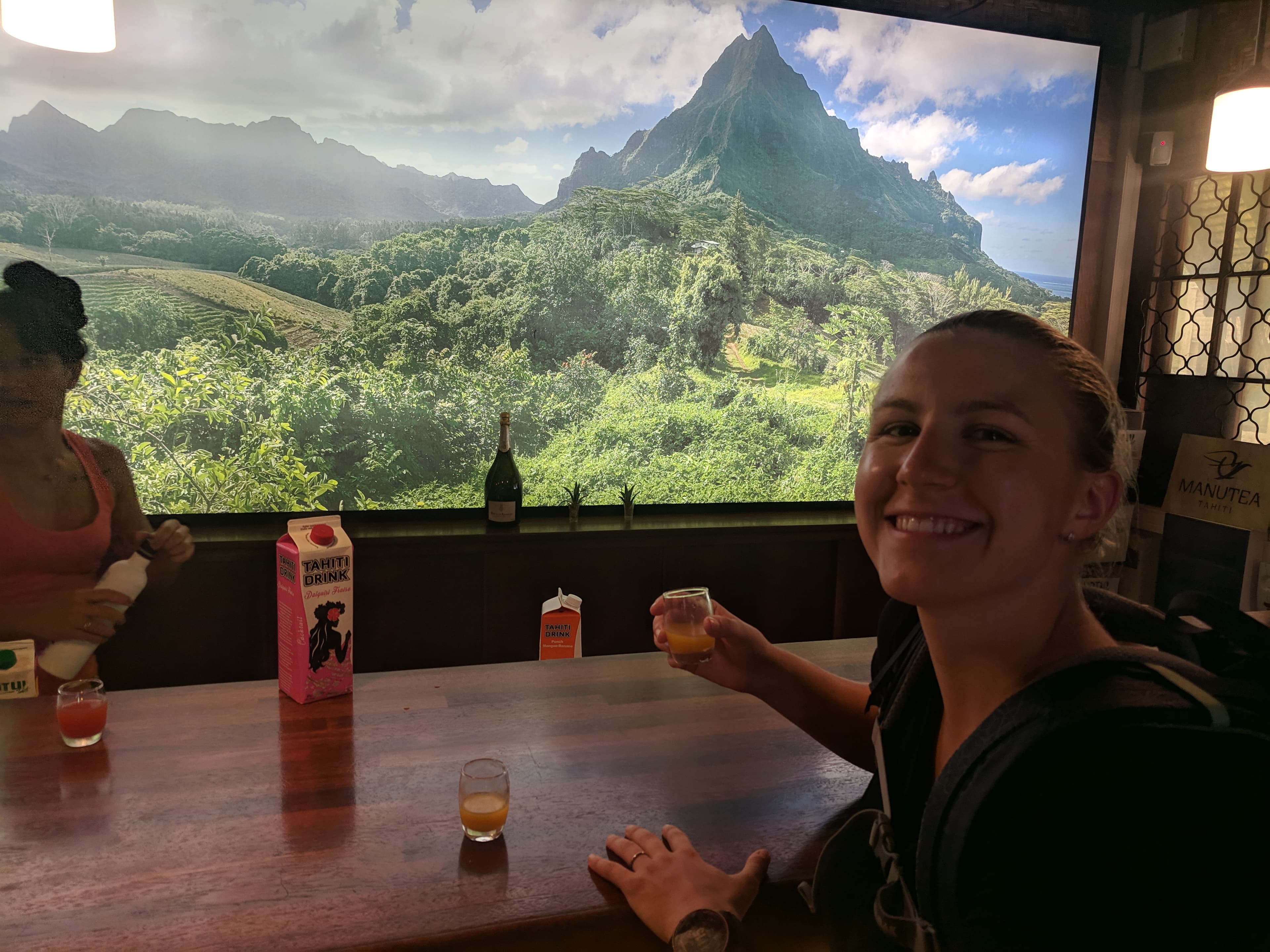 Lauren tasting juice at Rotui Juice Factory & Distillery Lauren tasting juice at Rotui Juice Factory & Distillery